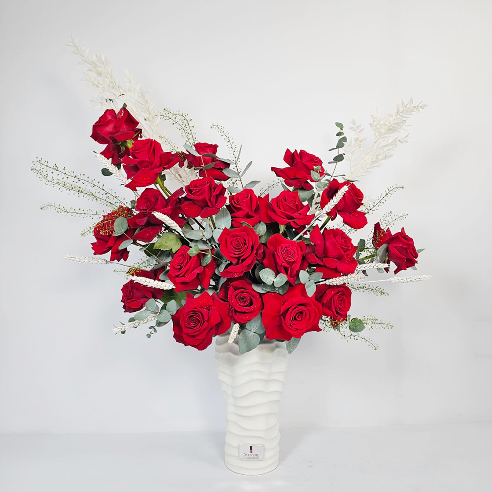 Dry ruscus rose vase